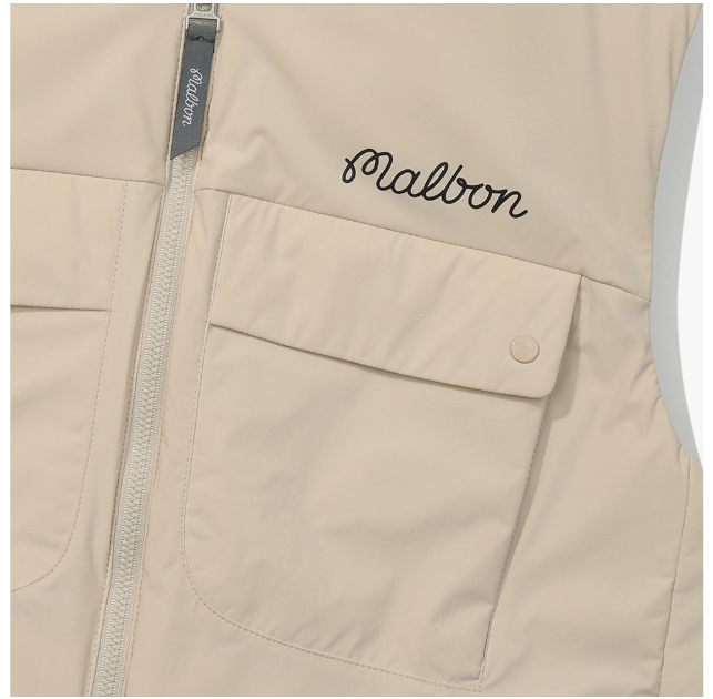 Malbon women's lightweight cargo windproof golf vest in Beige, pocket and trim detail
