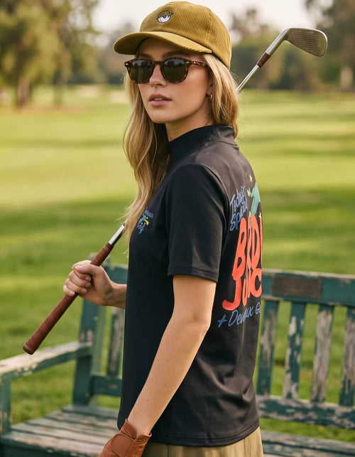 Devereux Black mock-neck golf tee rear view on model