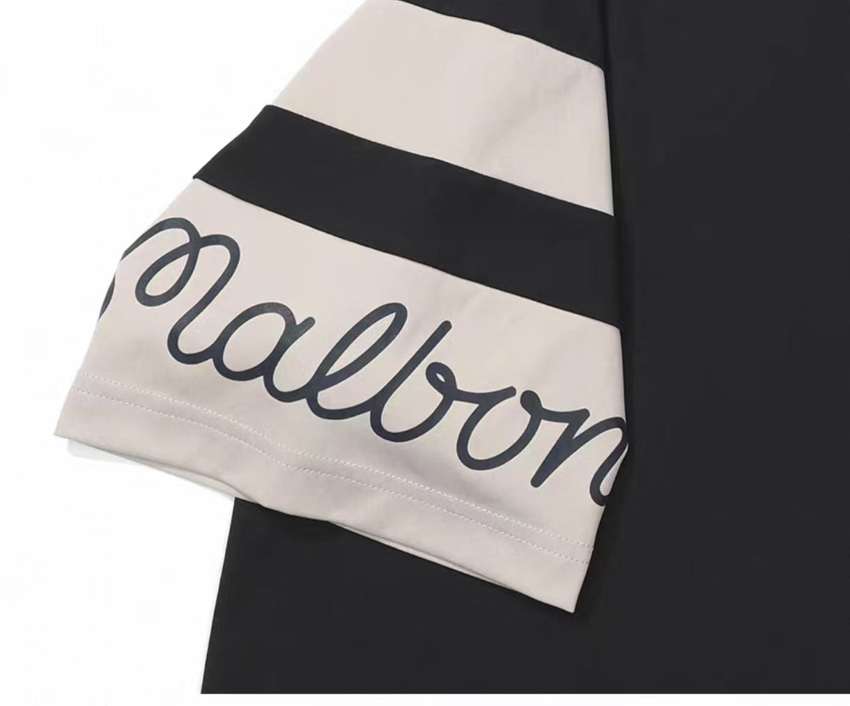 Malbon men's lightweight cooling quick-dry golf polo shirt in Black, lifestyle front view