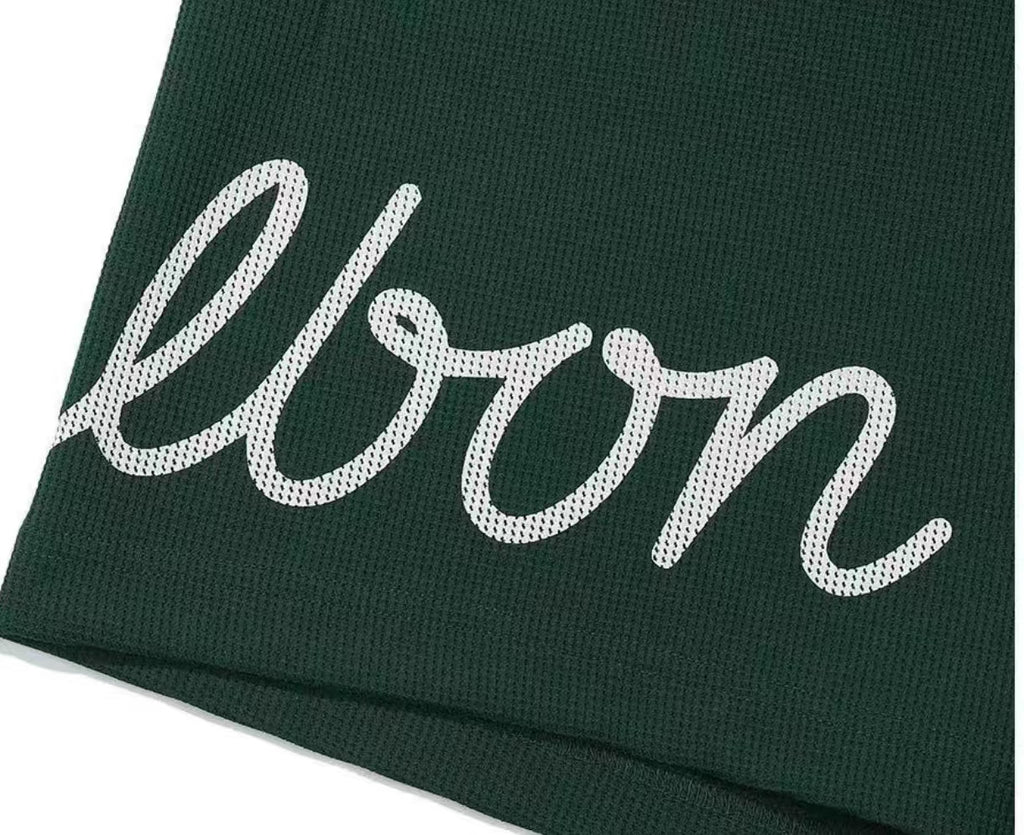 Malbon white golf shorts leg logo detail