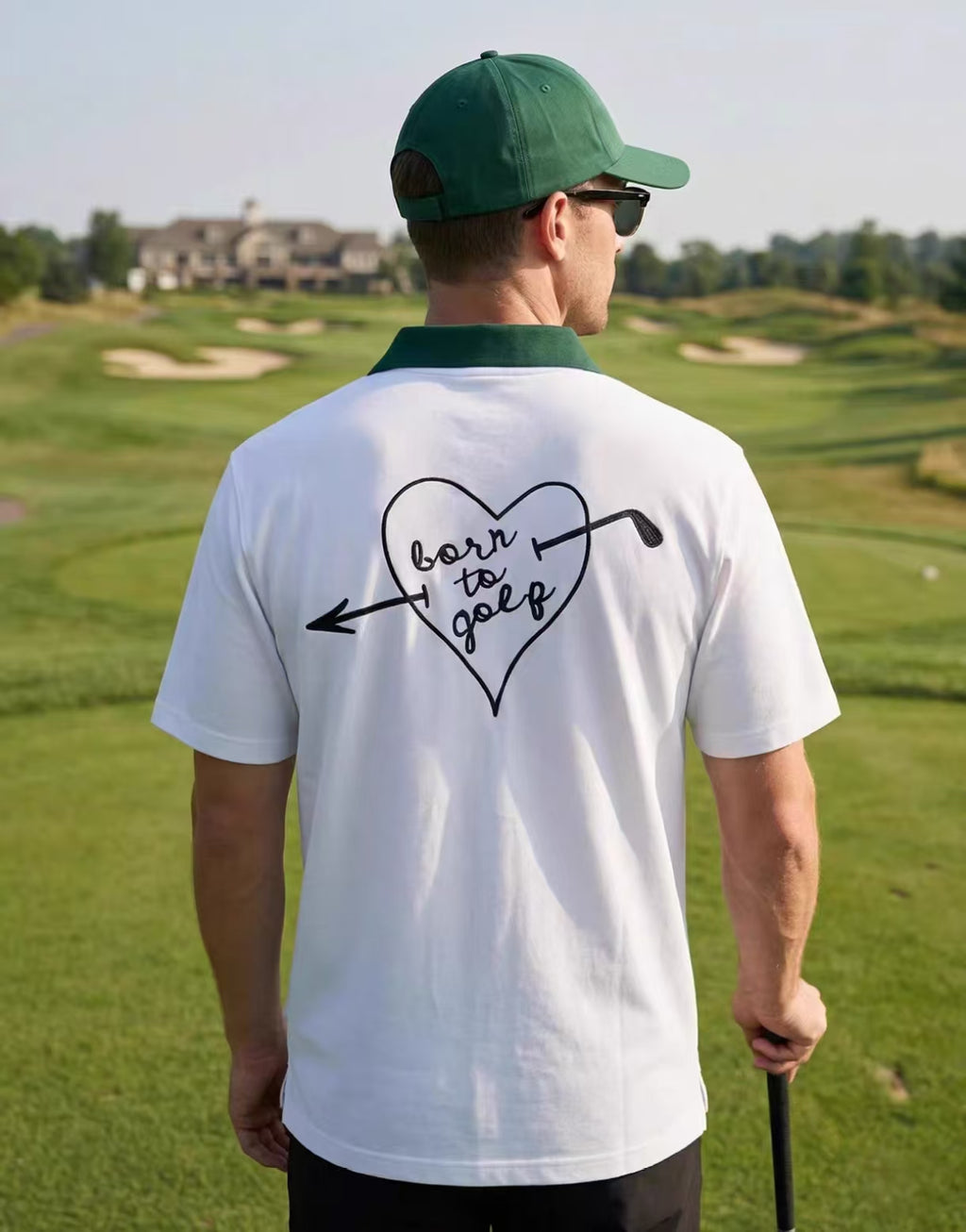 Devereux White and Green heart-print golf polo front view on male model