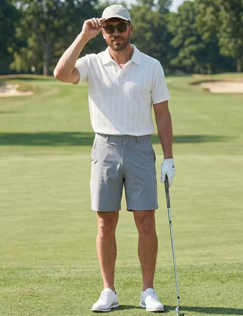 Devereux White breathable golf polo front view on male model