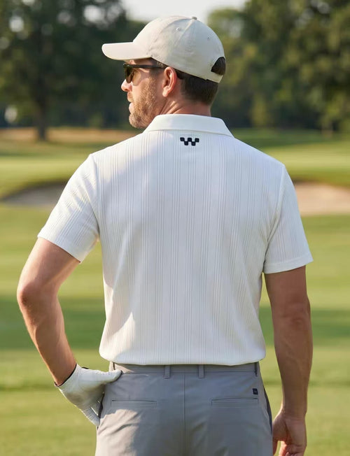 Devereux White collared golf polo side view on male model