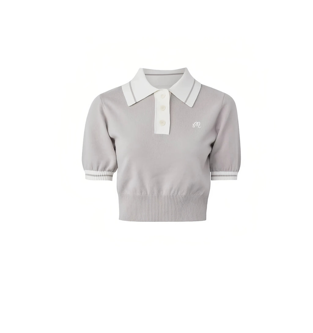 Malbon women knit golf polo in blue front view