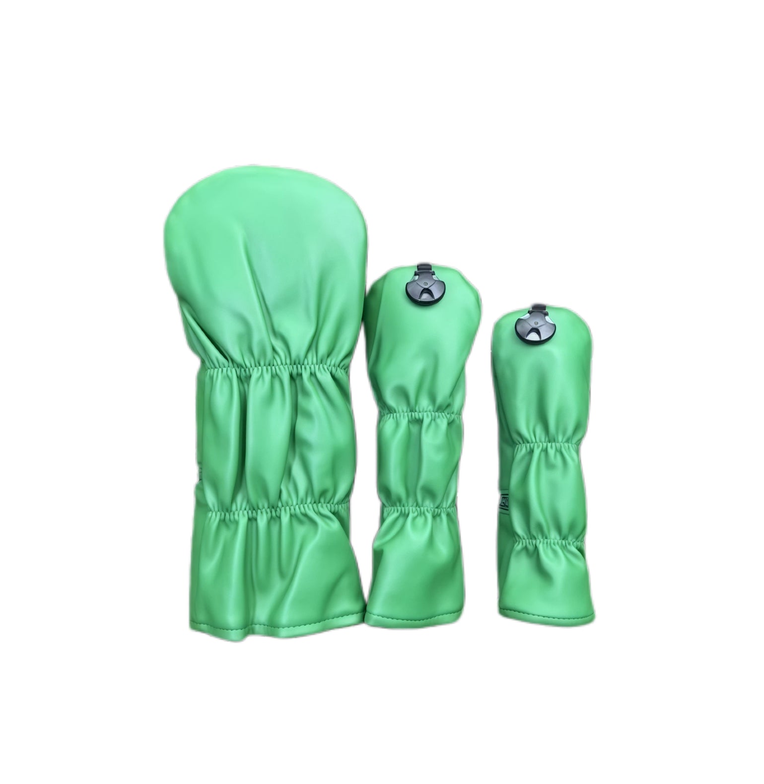 Back view of green cartoon puppy golf headcovers set showing elastic hem and smooth PU surface, designed for secure fit and durable protection.