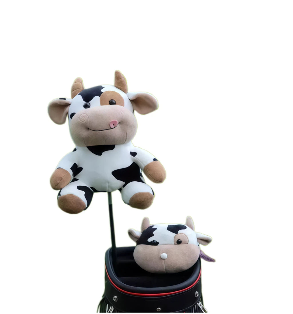 Full-body cow plush golf headcover in black and white, featuring a smiling face, and soft texture, compatible with driver and fairway woods for stylish protection and fun on the course.