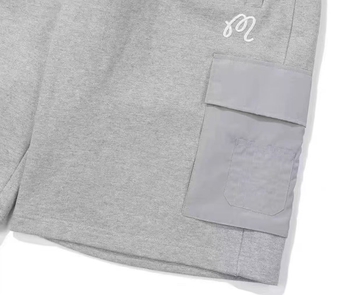 Malbon Men's Solid Embroidered Knit Shorts Grey knit golf shorts front view