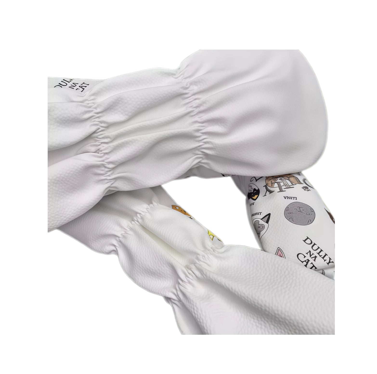 Close-up of Lazy Cat golf headcover showing elastic hem detail and colorful cat face print, highlighting durable PU material and secure fit.