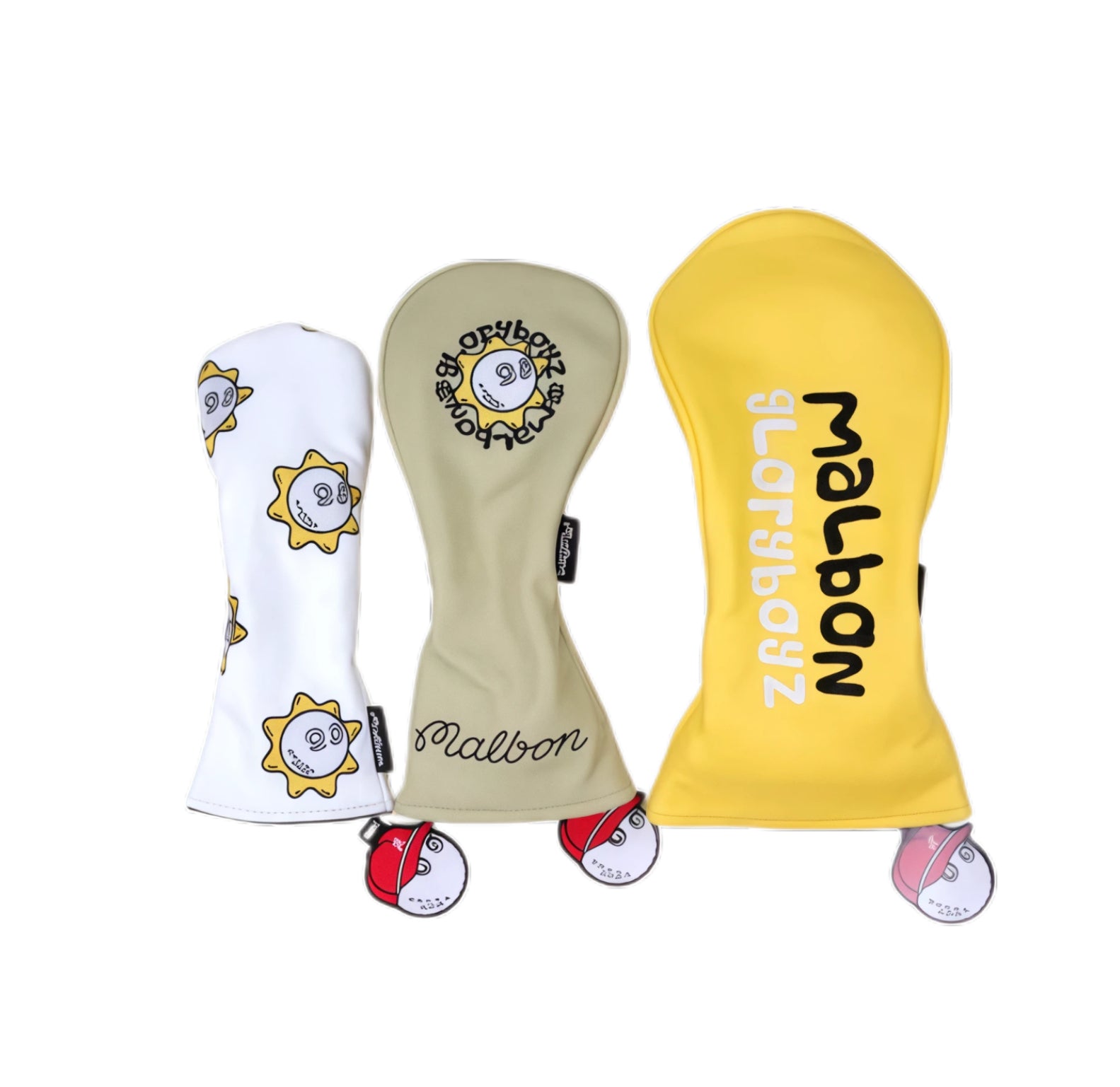 Three Malbon Gloryboyz driver headcovers in white (sun pattern), beige (circular sun logo), and yellow (vertical “Malbon Gloryboyz” text) — all featuring double-sided embroidery and red-capped magnetic ball clips.
