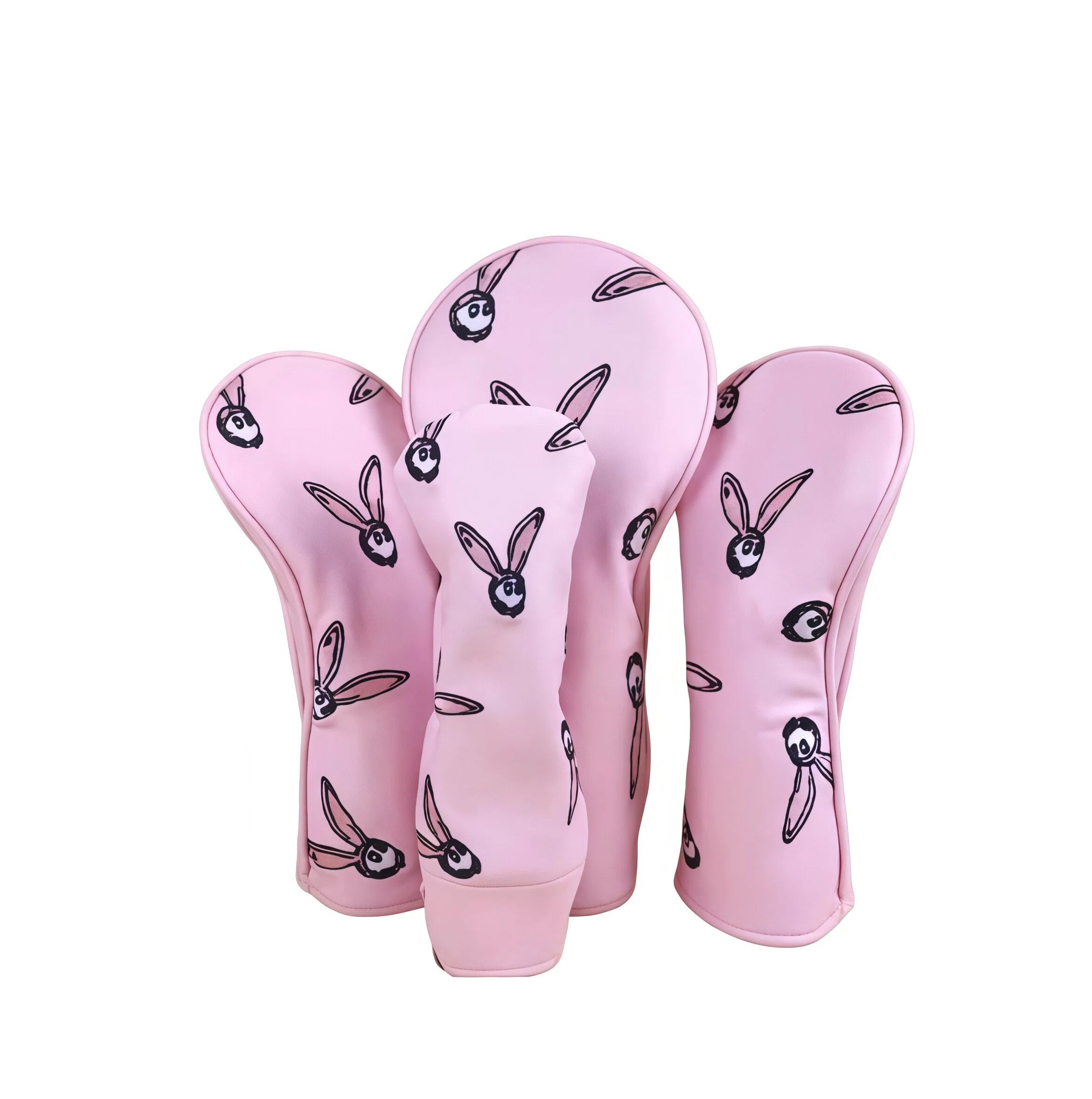 Set of four Malbon Golf light pink bunny-themed headcovers featuring cute black-and-pink rabbit prints, including one driver, one fairway wood, one hybrid, and one iron cover — perfect for women and fun-loving golfers.
