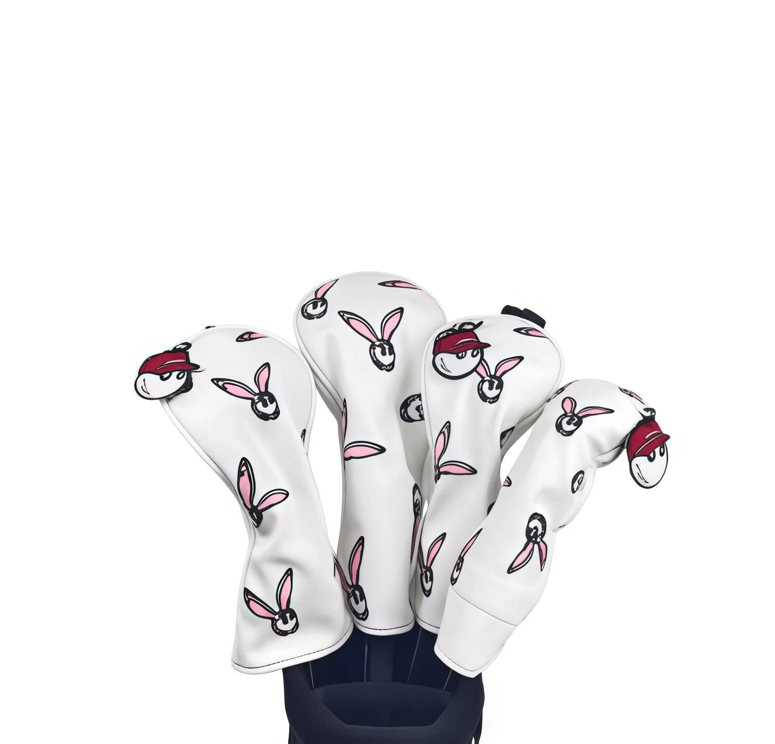 Set of white Malbon Golf headcovers featuring playful pink bunny faces and red baseball cap charms, ideal for protecting driver, fairway wood, hybrid, and putter clubs with a fun, whimsical design.
