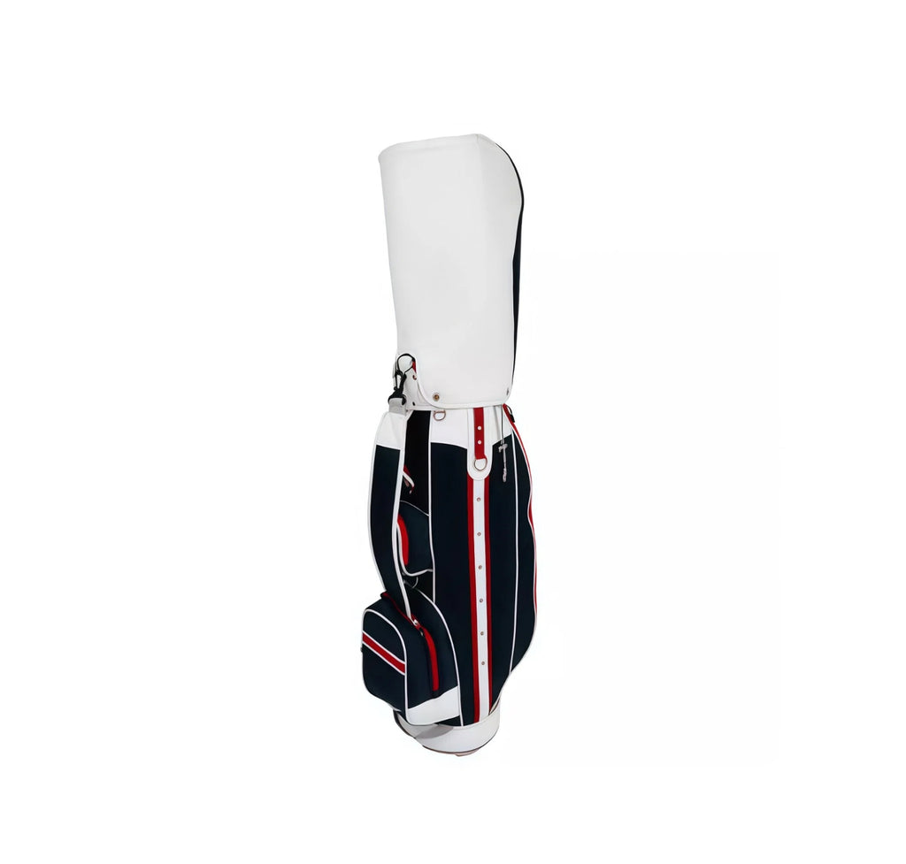 Side view of the Mizuno Heritage Cart Bag in classic navy, red, and white colorway, featuring a full-length protective hood, vintage-inspired piping, quilted panels, and retro-style hardware.