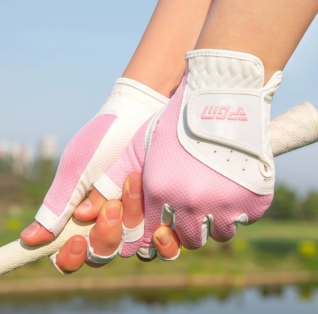 A close-up shot of a woman's hands wearing pink PGM fingerless golf gloves, demonstrating a secure and confident grip on a golf club. The image highlights the glove's fit and anti-slip palm texture.