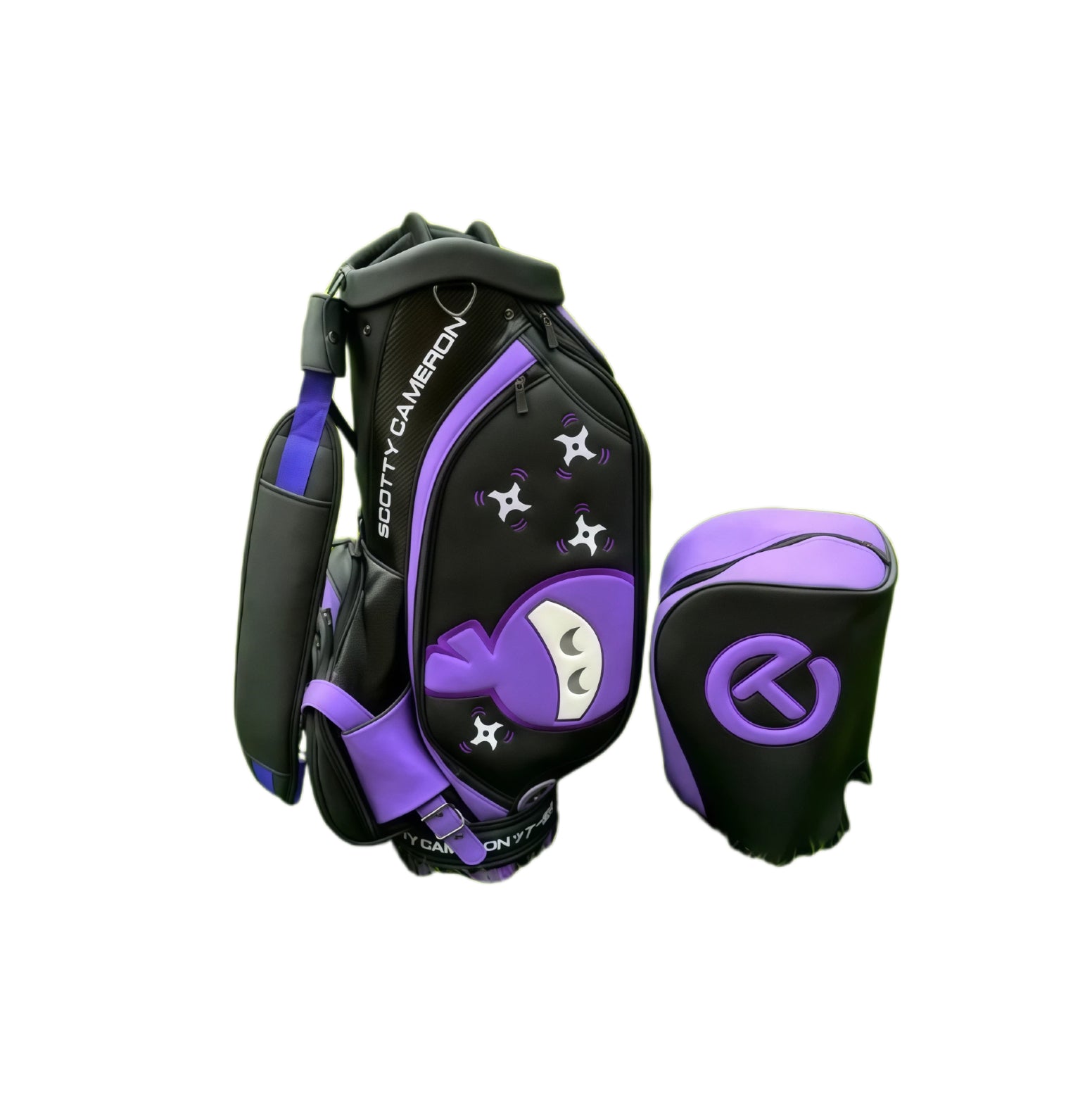 A clean, studio product shot of the Scotty Cameron Camo Collage Tour Bag and matching headcover on a white background. This image clearly displays the bag's black and purple color scheme, ninja graphic, and "Circle T" branding for online shoppers.