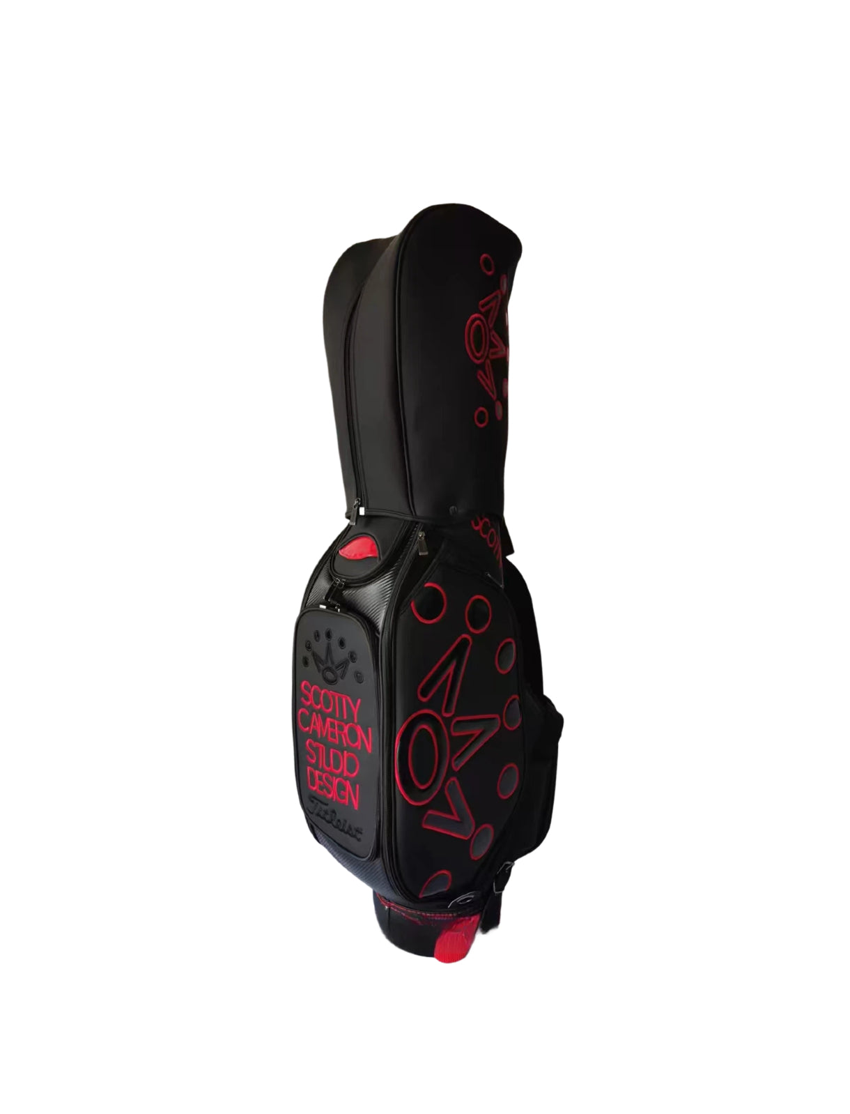 Front view of the Scotty Cameron Supercar Staff Bag showcasing the accessory pocket with "SCOTTY CAMERON STUDIO DESIGN" text, the red "NOV" crown graphic, and the Titleist logo at the bottom.