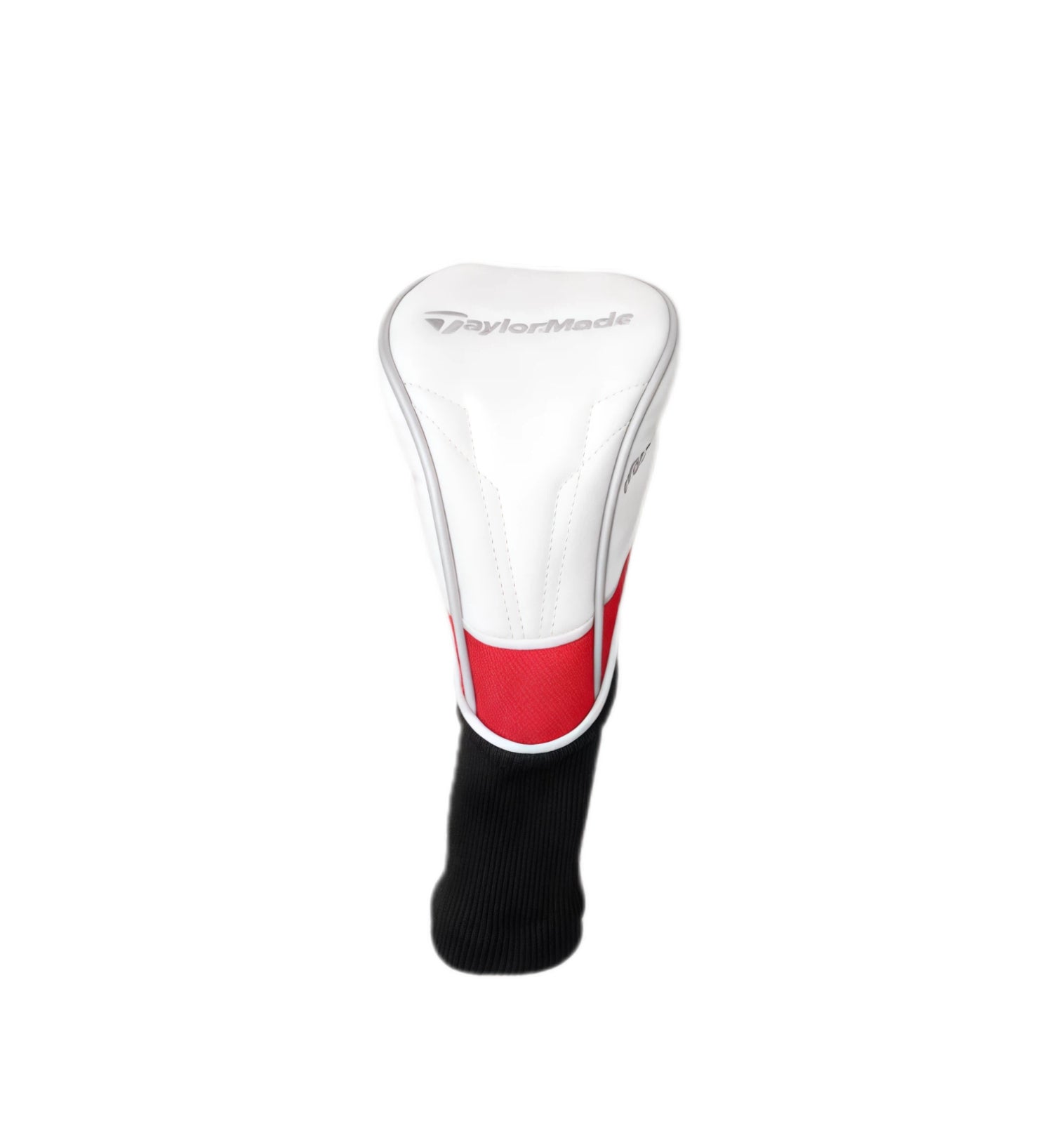 Close-up of TaylorMade driver headcover in white PU material with red lower panel, black stretch sleeve, and embossed "TaylorMade" logo — designed for durability and brand recognition.