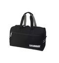 Black TaylorMade golf duffel bag with white "TAYLORAIAD" logo. Designed for travel, gym, or golf with durable fabric, front compartment, and reinforced handles.