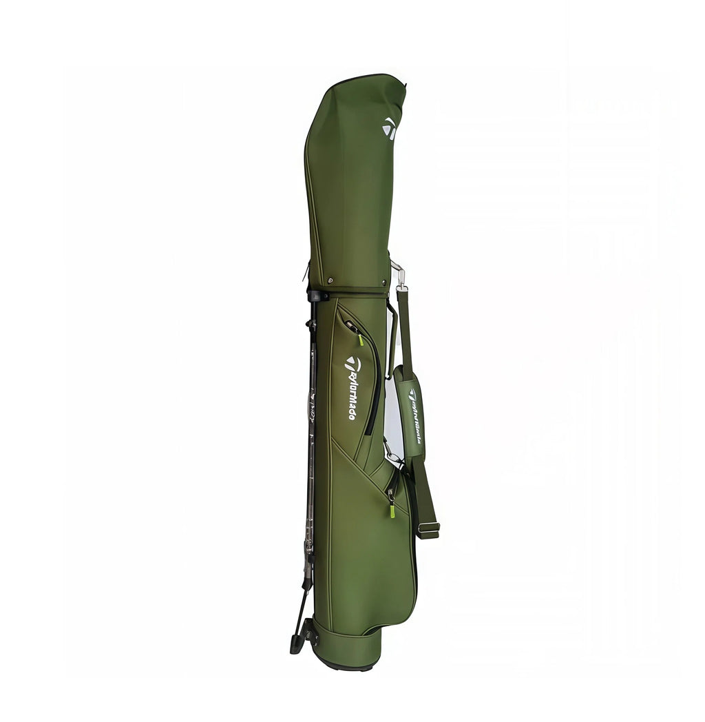 Side profile of the olive green TaylorMade stand golf bag showing the white TaylorMade logo, reinforced stitching, and zippered side pocket. Made from durable, water-resistant material ideal for outdoor play.