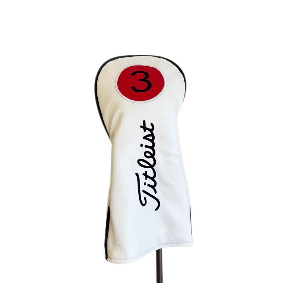 White Titleist-style fairway wood headcover with red circular "3" patch and black "Titleist" script logo, displayed on a stand — made from premium synthetic leather material for long-lasting protection and a sleek, professional look.