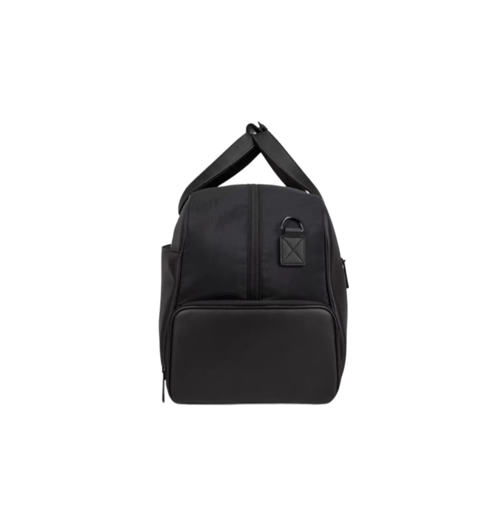 Back view of the black Titleist Premium Golf Duffel featuring a removable padded shoulder strap, structured body, and reinforced stitching. Designed for comfort and durability during travel and golf outings.