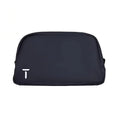 Top-down view of the black European Tour accessory pouch showing the centered white "T" logo and clean stitching. Designed for compact, organized storage.
