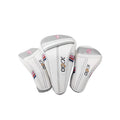 White XXIO golf headcover set featuring driver, fairway wood, and hybrid covers with sleek pink, blue, and gray striped accents — premium PU material with "XXIO" branding and numbered tops for easy identification.