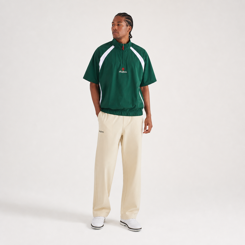 Malbon CLOT green golf windshirt angled view